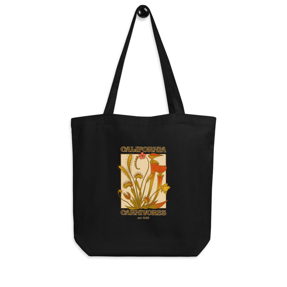 Black tote bag with a floral design and 'California Carnivores' text on a white background
