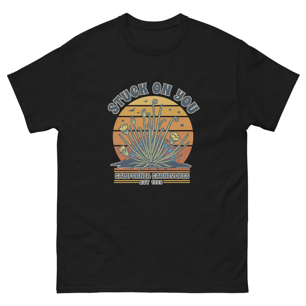 Black t-shirt with a graphic design on a white background
