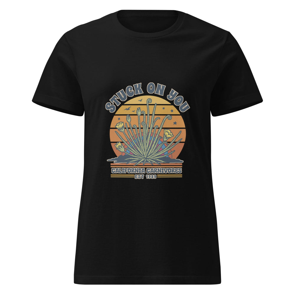 Black t-shirt with a graphic design featuring text and cacti on a white background