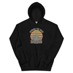 Black hoodie with a graphic of a face and text on a white background