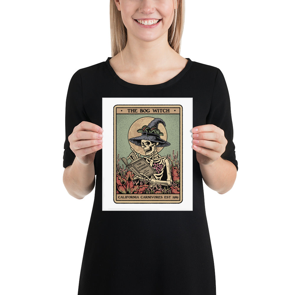 Person holding a print of 'The Bog Witch' card by Anne Stokes.