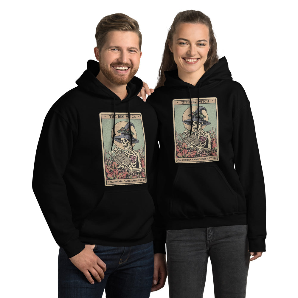 Two people wearing black hoodies with graphic designs on a white background