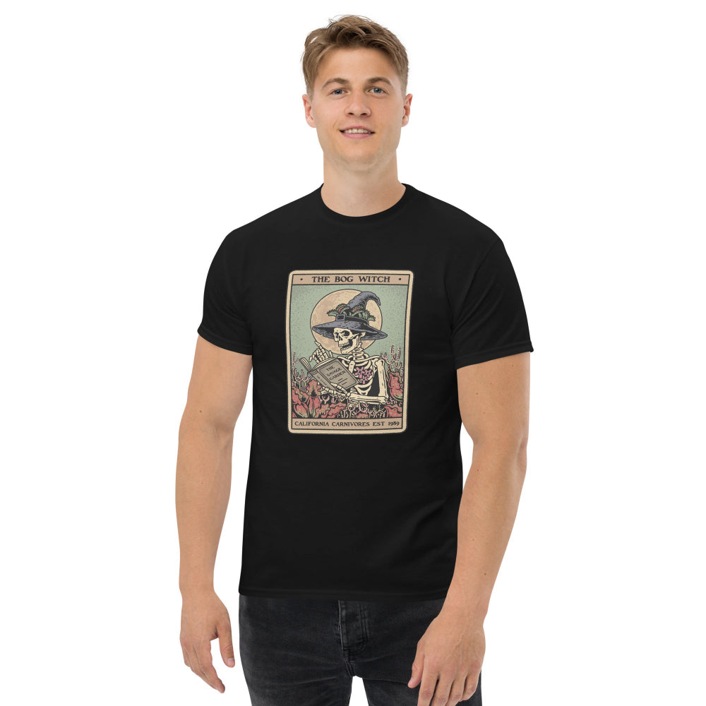 Person wearing a black t-shirt with a graphic design on a white background