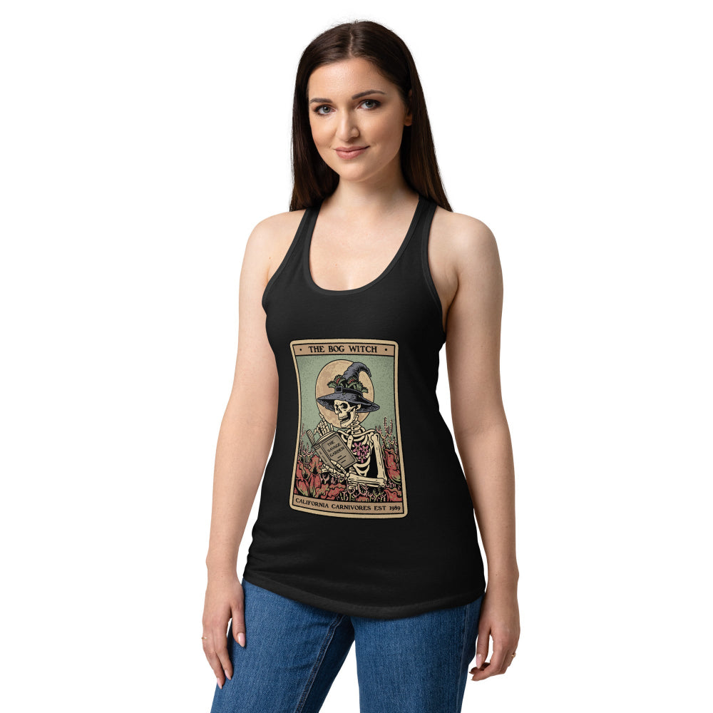 Woman wearing a black tank top with a graphic design on a white background