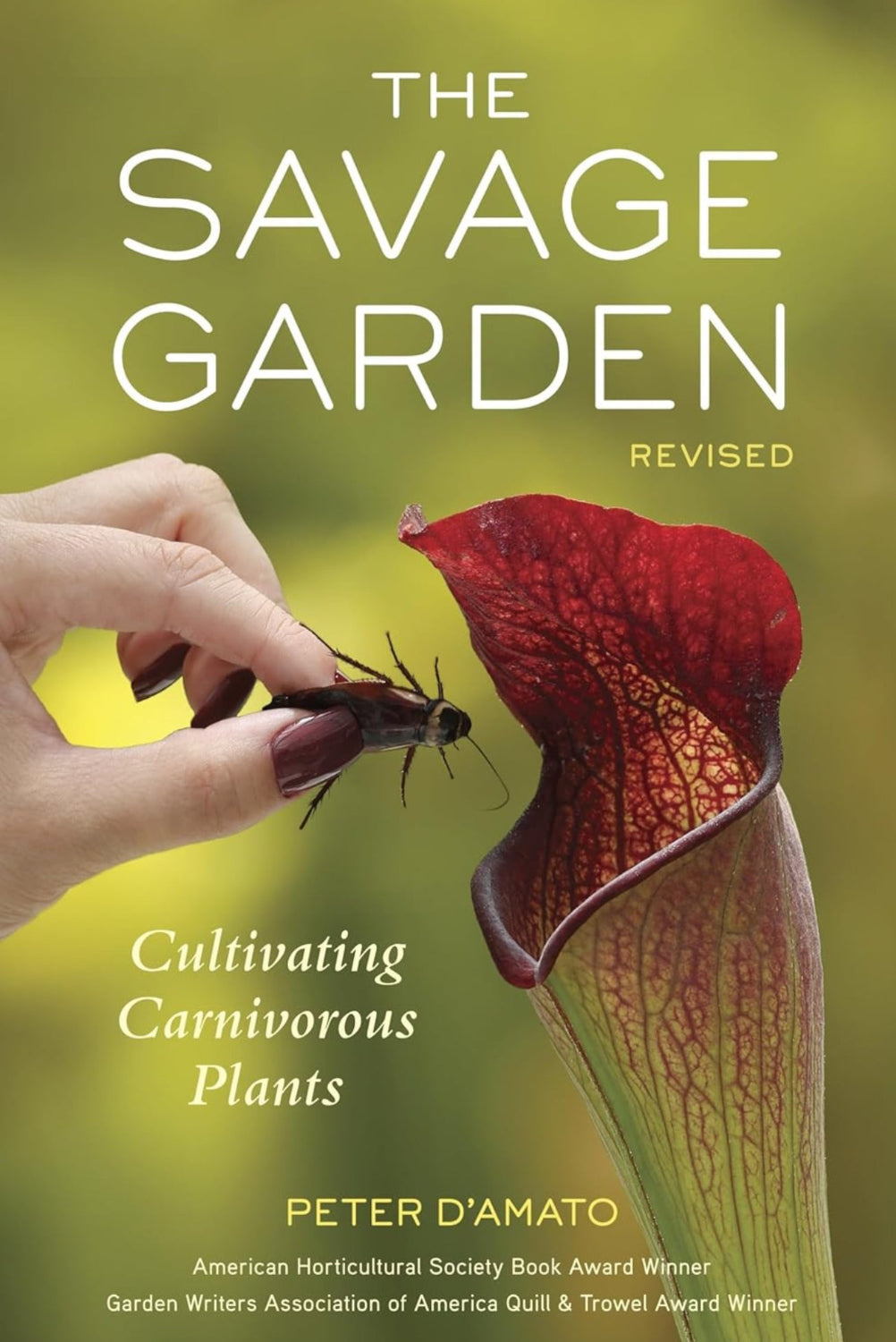 Book cover of 'The Savage Garden' with a hand holding a red pitcher plant and a blurred green background.