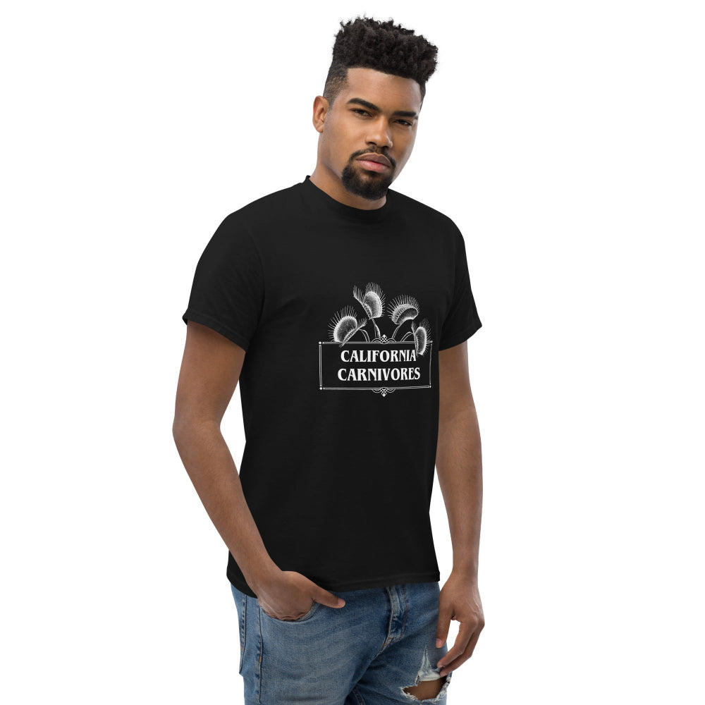 Man wearing a black t-shirt with a logo graphic on a white background