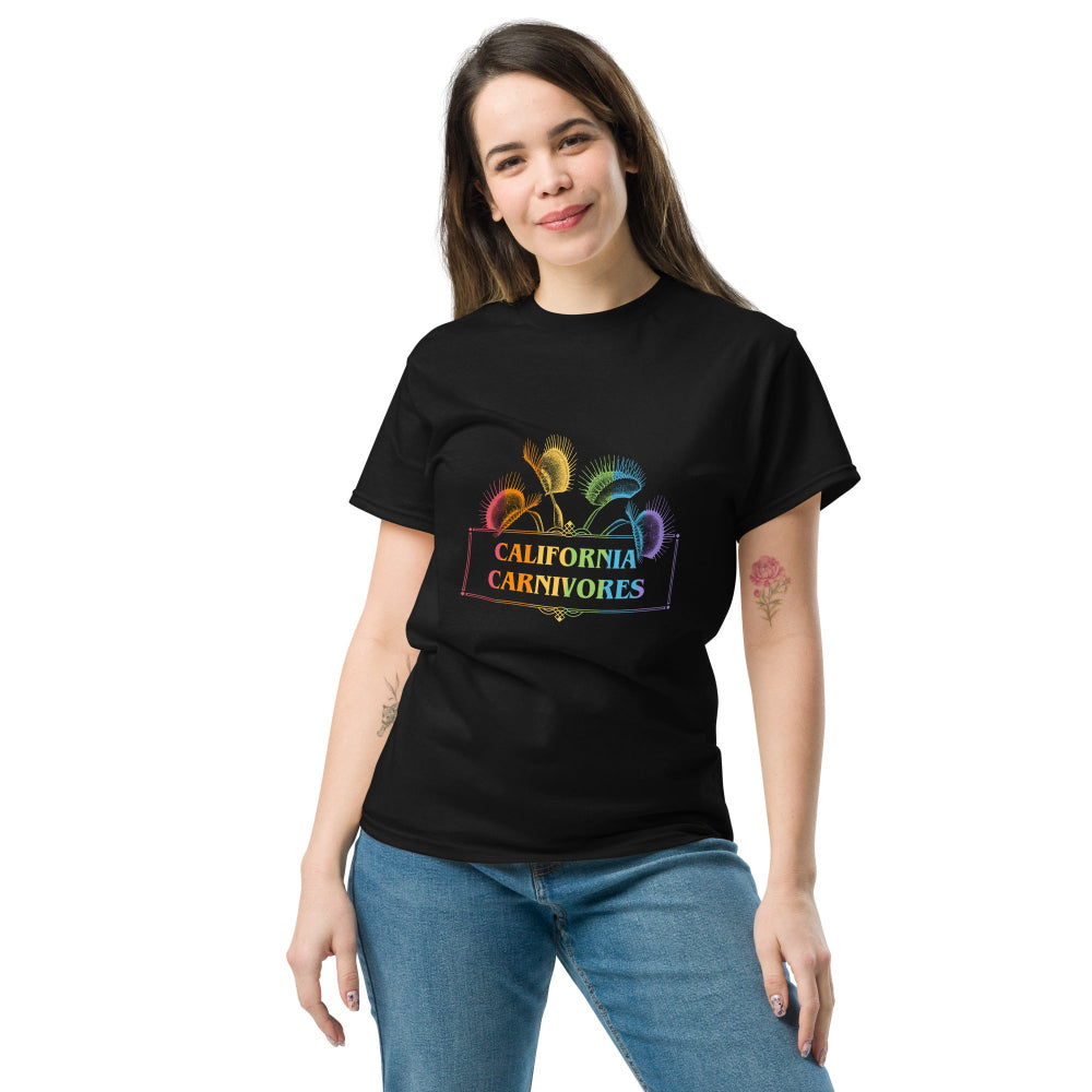 Woman wearing a black t-shirt with a graphic design and text, standing against a white background
