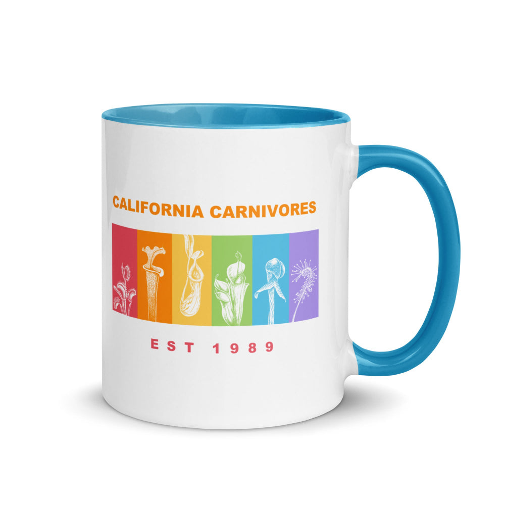 White mug with blue handle and interior, featuring 'California Carnivores' logo and text on a white background.
