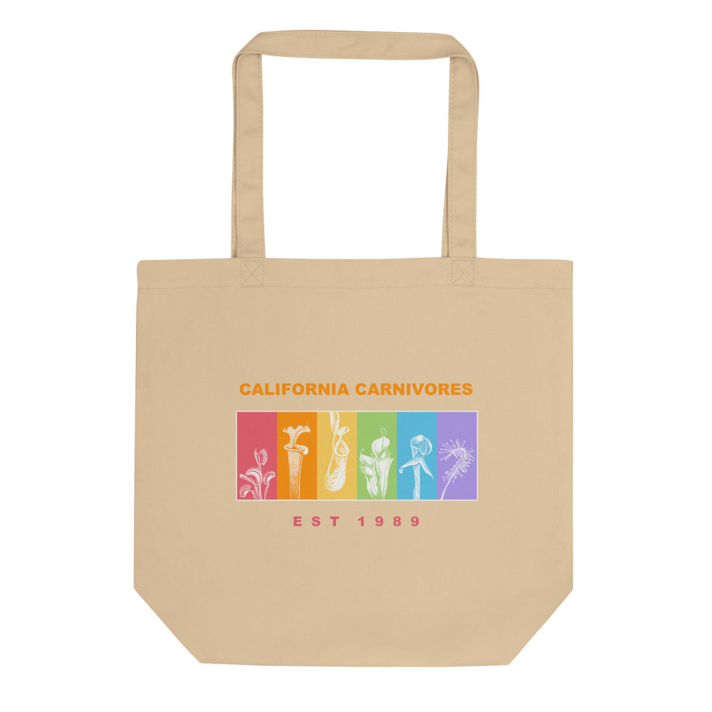 Beige tote bag with colorful graphic and text on a white background