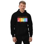 Person wearing a black hoodie with a colorful graphic and text on a white background