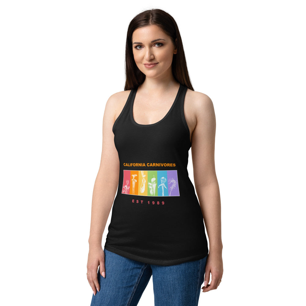 Woman wearing a black tank top with a colorful graphic design on a white background