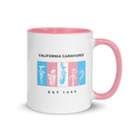White mug with pink interior and handle featuring 'California Carnivores' logo and text.