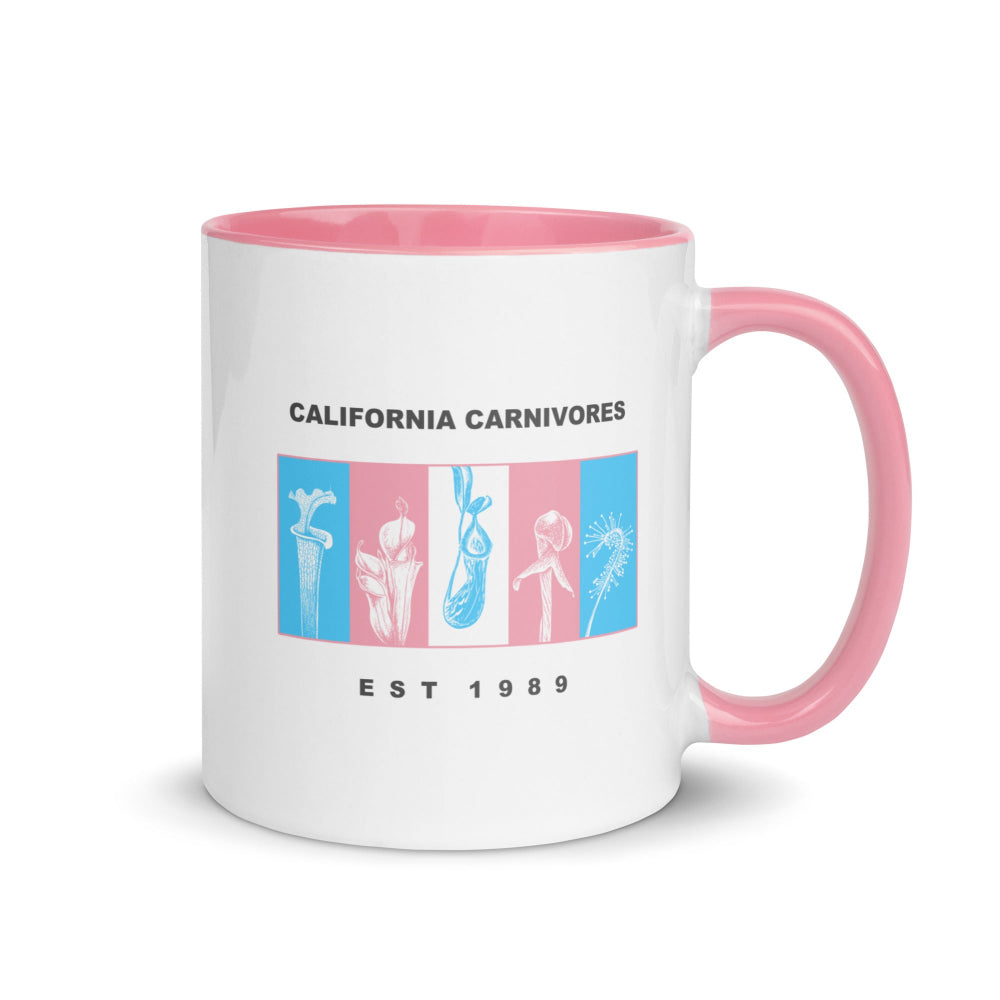 White mug with pink interior and handle featuring 'California Carnivores' logo and text.