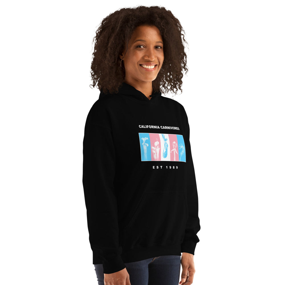 Person wearing a black hoodie with a colorful graphic design on a white background