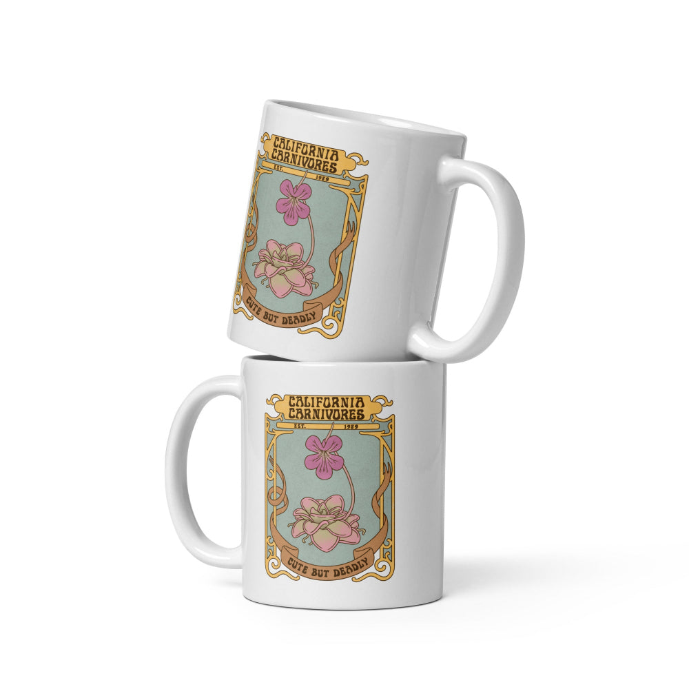 Two white mugs with decorative floral design and text on a white background