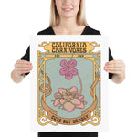 Person holding a poster with decorative text and illustrations of flowers.