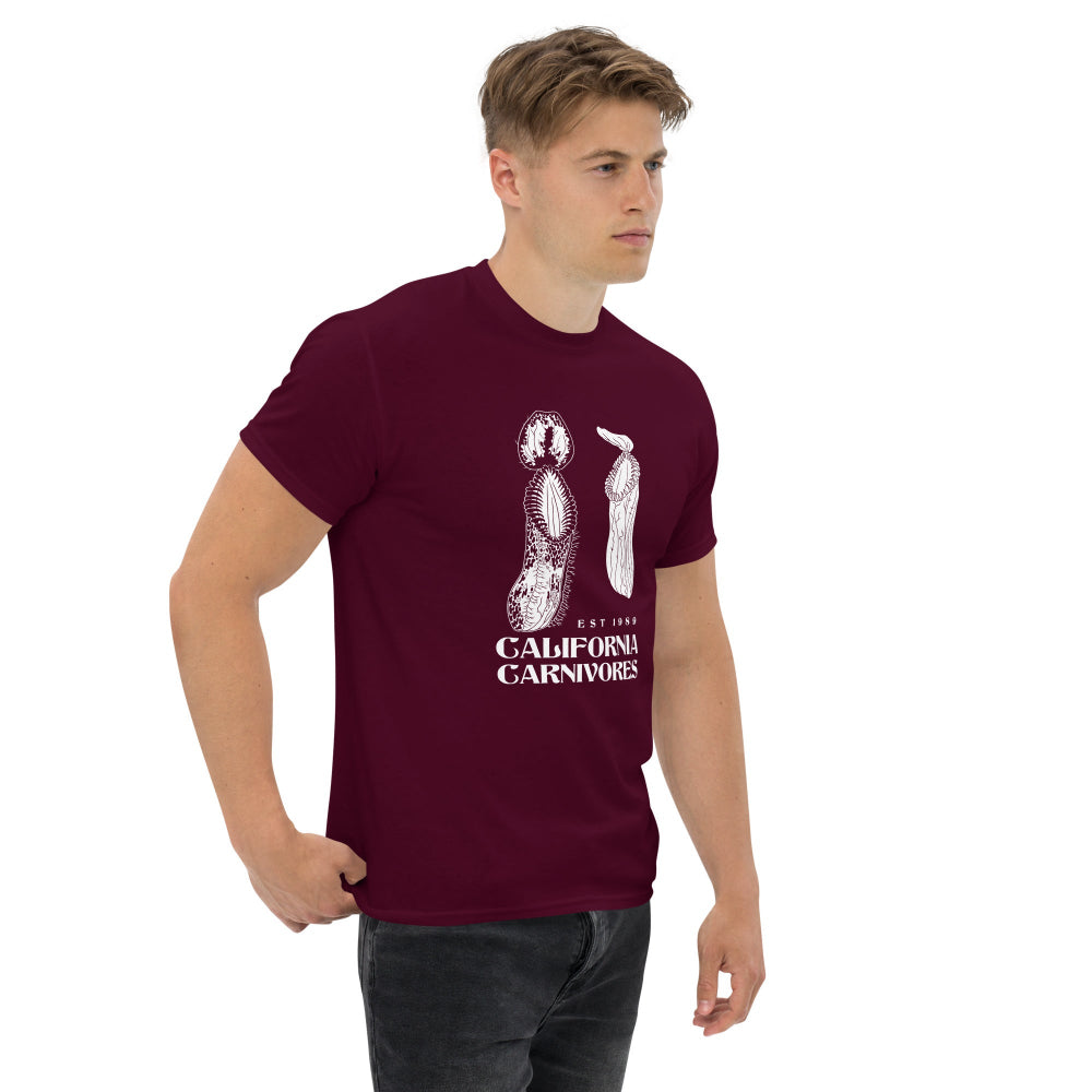 Man wearing a maroon t-shirt with a graphic design and text on a white background