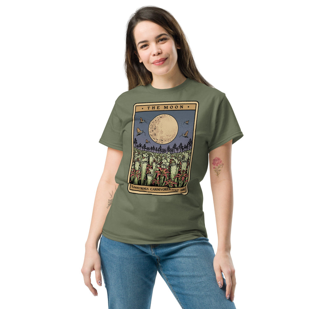 Woman wearing a green t-shirt with a graphic design on a white background
