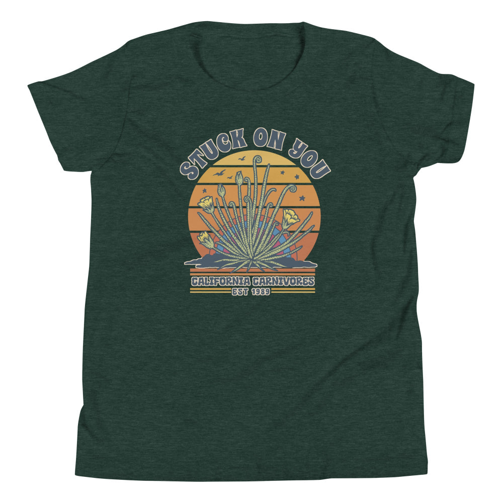 Green t-shirt with a graphic design on a white background
