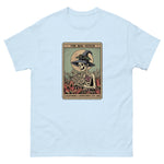 Light blue t-shirt with a graphic of 'The Bog Witch' design on a white background