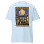 Light blue t-shirt with 'The Moon' graphic design on a white background
