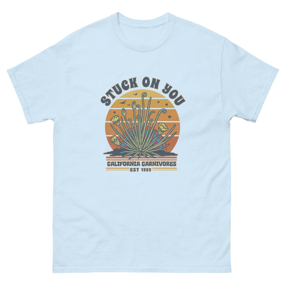 Light blue t-shirt with a graphic design on a white background