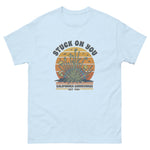 Light blue t-shirt with a graphic design on a white background
