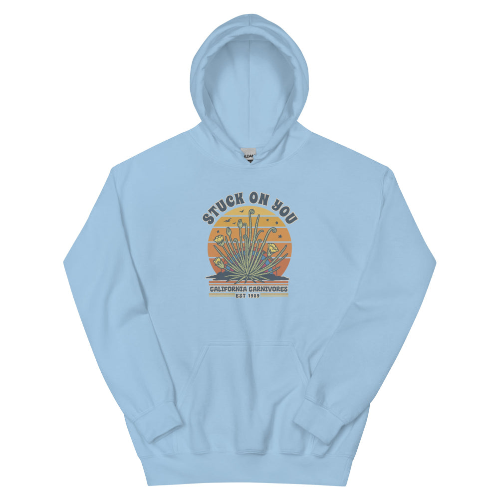 Light blue hoodie with a graphic design on a white background