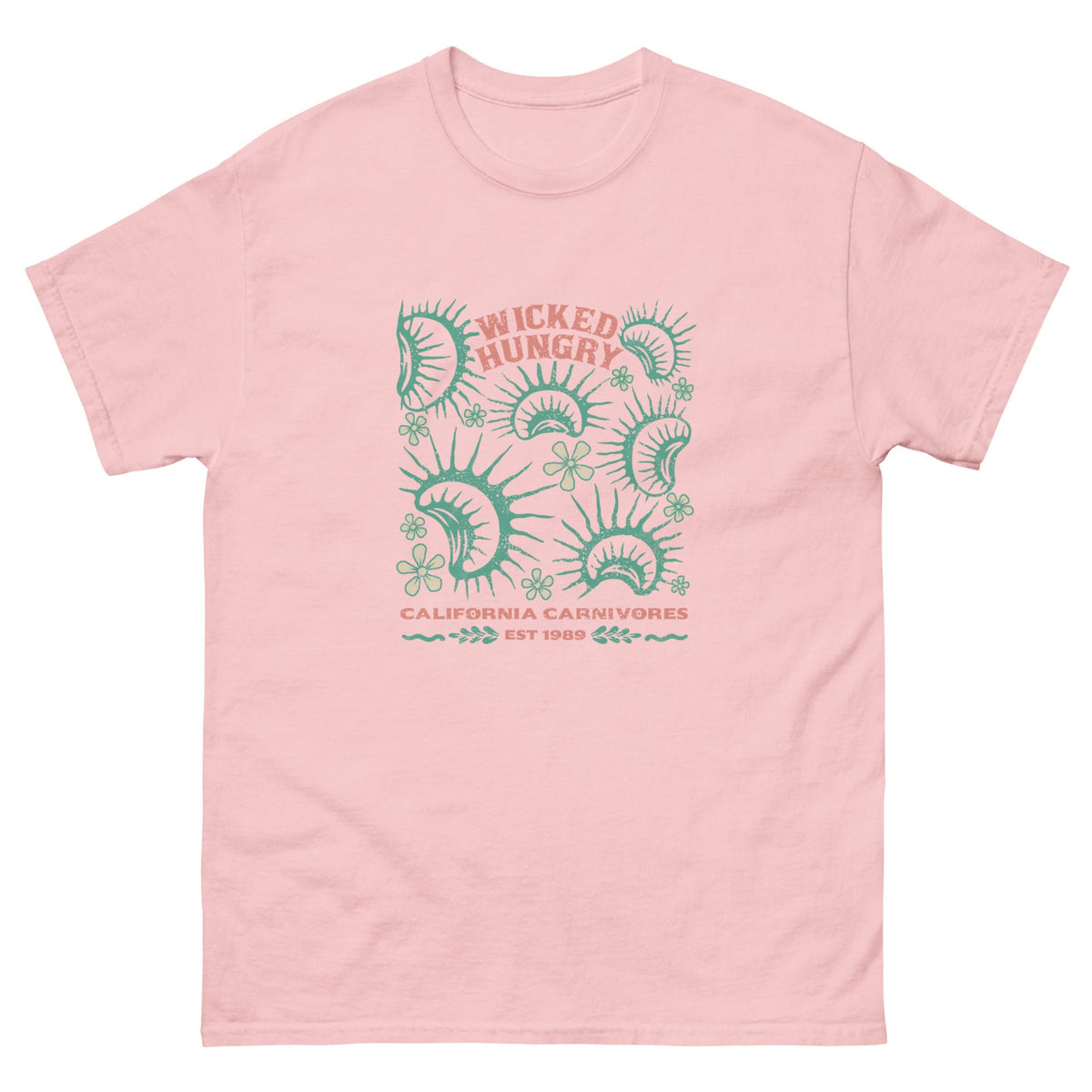 Light Pink California Carnivores unisex shirt with Wicked Hungry in coral, in the upper middle, surrounded by wood block print style flytraps in teal. 