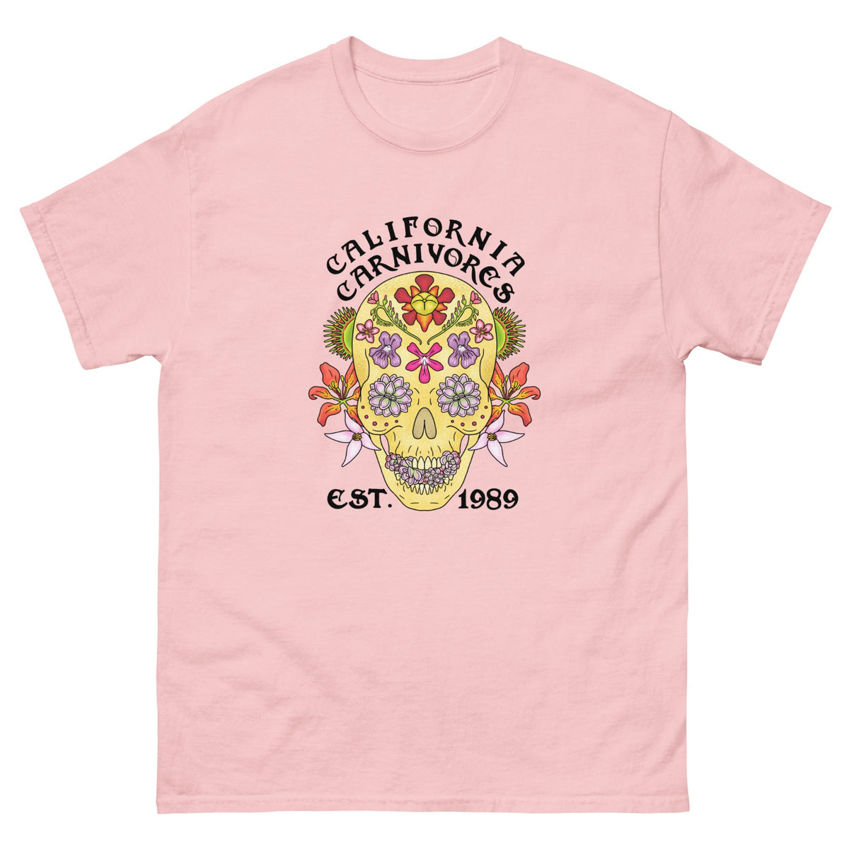 Pink t-shirt with a colorful skull design and 'California Carnivores' text on a white background