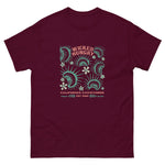 Maroon California Carnivores unisex shirt with Wicked Hungry in coral, in the upper middle, surrounded by wood block print style flytraps in teal. 