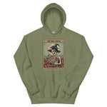 Green hoodie with a graphic design of a skeleton in a witch hat and broomstick on a white background