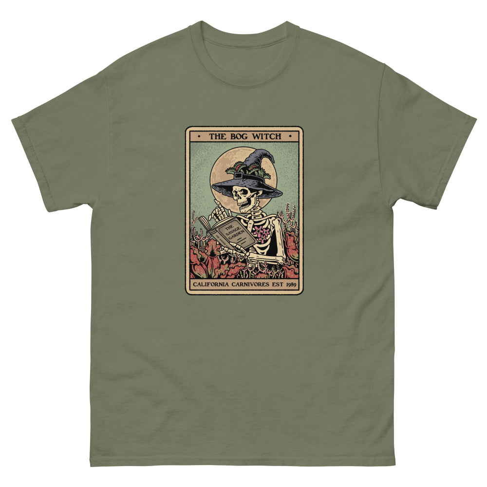 Green t-shirt with a graphic of 'The Bog Witch' design on a white background