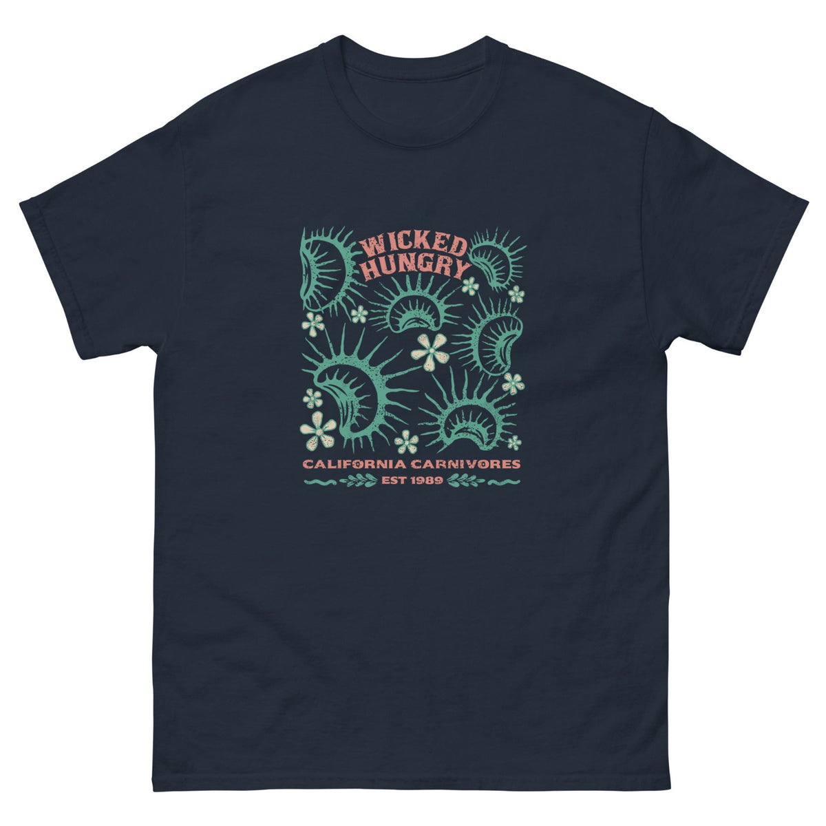 Navy California Carnivores unisex shirt with Wicked Hungry in coral, in the upper middle, surrounded by wood block print style flytraps in teal. 