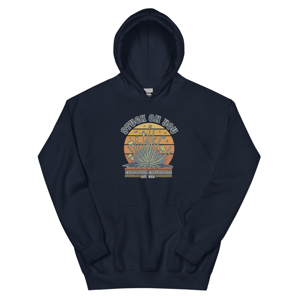 Navy blue hoodie with a graphic of a face and text on a white background