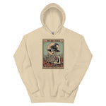 Beige hoodie with a graphic design of a skeleton in a witch hat and book on a white background