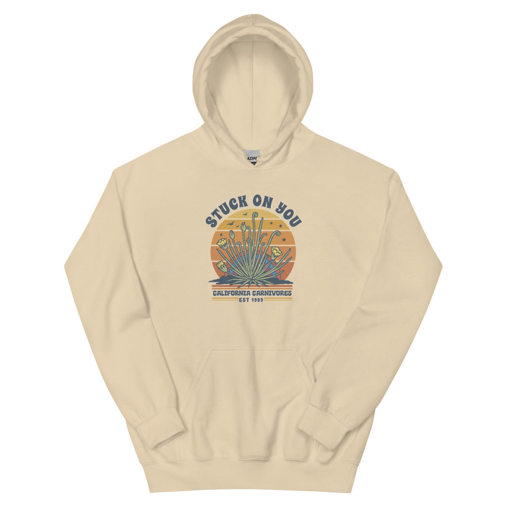 Beige hoodie with a graphic design on a white background