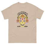 Beige t-shirt with a colorful skull design and 'California Carnivores' text on a white background