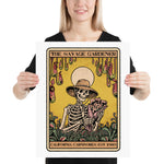 Person holding a poster with a skeleton wearing a hat and holding flowers, titled 'The Savage Gardener'.