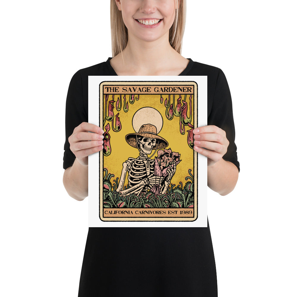 Person holding a poster titled 'The Savage Gardener' with a skeleton design.