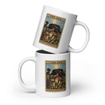 Two white mugs with 'The Sun' tarot card design stacked on a white background
