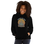 Person wearing a black hoodie with a logo on a white background
