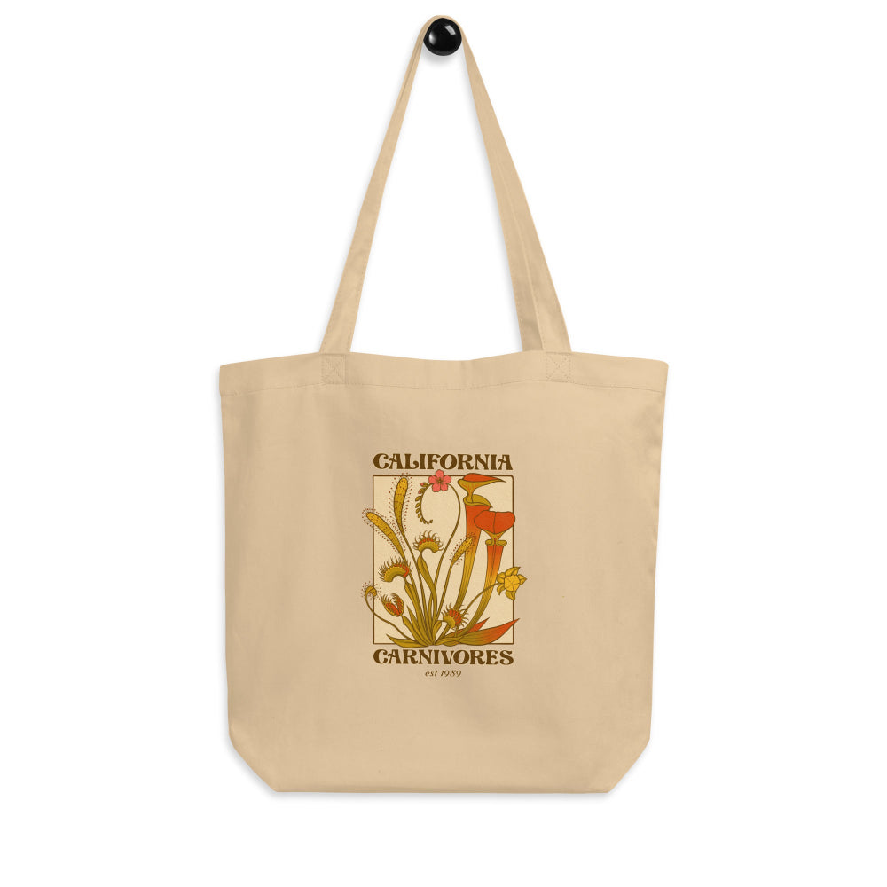 Beige tote bag with plant design and text on a white background
