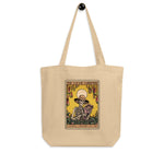 Beige tote bag with a graphic design featuring a skeleton and text on a white background