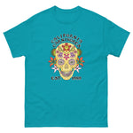 Teal t-shirt with a colorful skull design and text on a white background