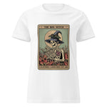 White t-shirt with a graphic design featuring a skeleton in a witch hat and text on a white background