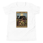 The Shining Sun white youth unisex shirt has a heliamphora in the sun styled after a tarot card.