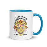 Mug with floral skull design and 'California Carnivores' text on a white background
