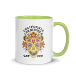 Mug with floral skull design and 'California Carnivores' text on a white background