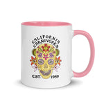 Mug with floral skull design and 'California Carnivores' text on a white background